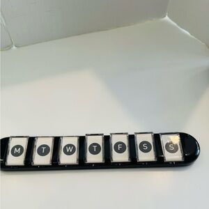 Daily Reminder Tool Cool Gadget, Mon thru Sun. Flip tile when task is completed